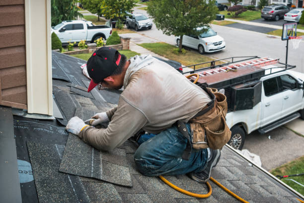 Professional Emergency Roof Repair technician working in Calumet, MI